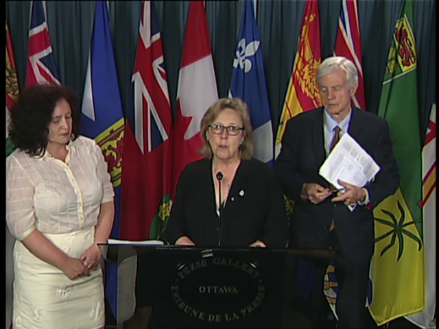 Headline Politics : Elizabeth May Urges Government to Grant Russian Scientist Asylum