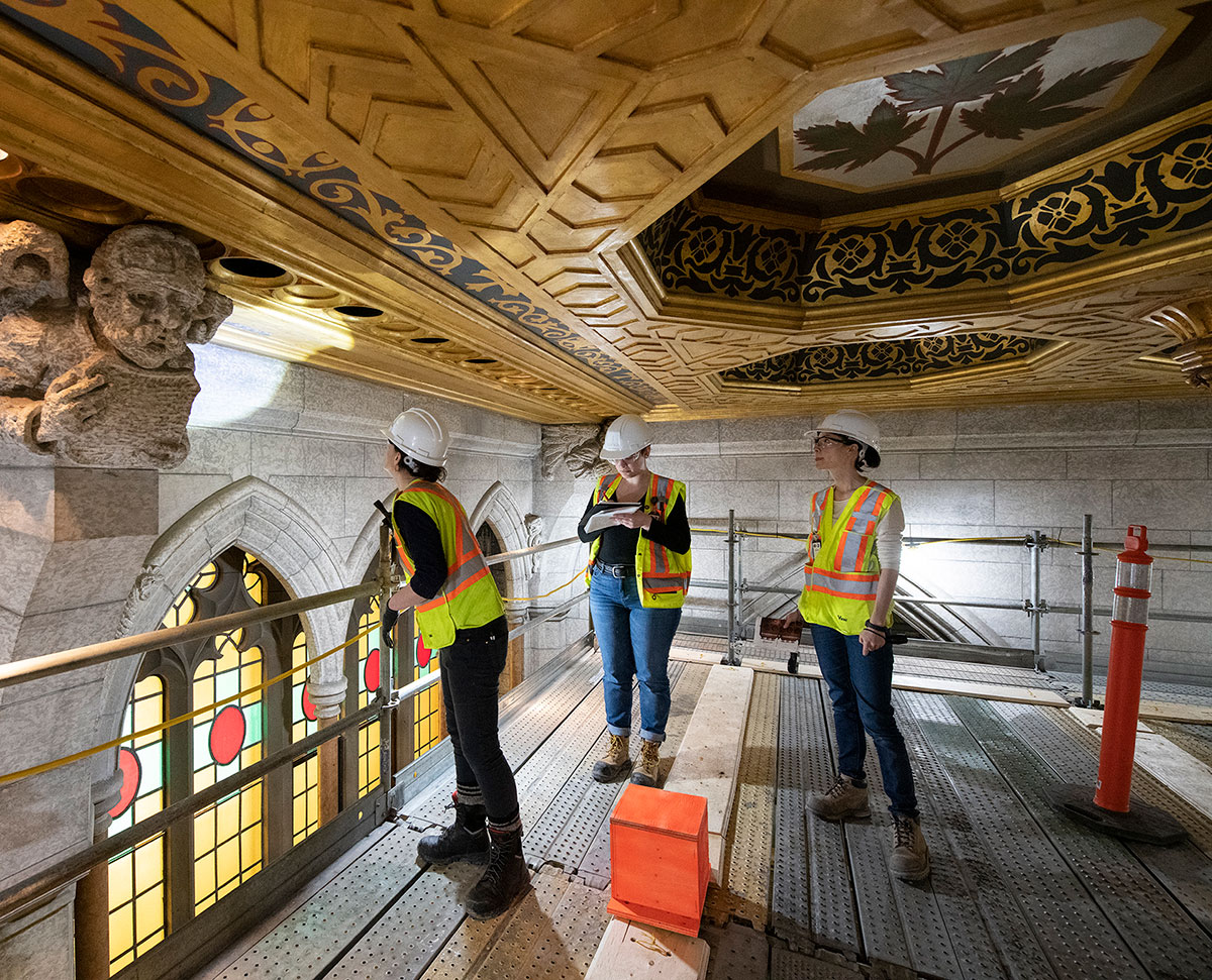 Examining the ceiling in the Senate Chamber